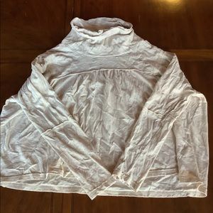 beige altered state turtleneck with flower details